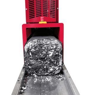 Maschine von NEXTPACK welche Schaumreste zu einem Ballen presst